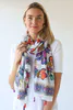 Model wearing Multi Lightweight Large Flower Print Scarf with Tassells By Archer House Available at Beetees Nelson